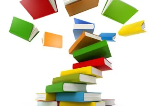 Logo der Stadtbücherei Kolbermoor sind bunte gestapelte Bücher